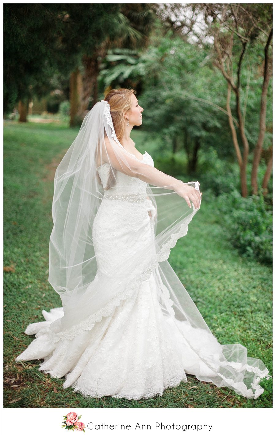 bride twirling with her veil 