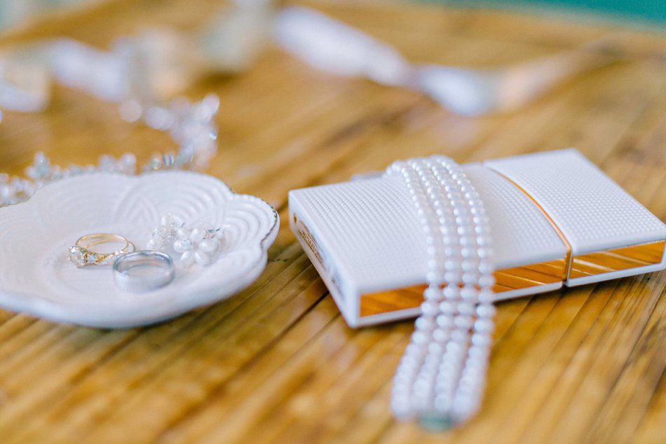 Brides white details. Destination wedding at the Postcard Inn on the Beach by Catherine Ann Photography