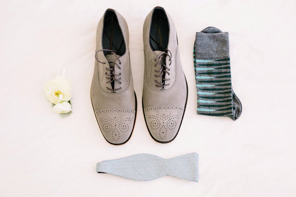 Gray and blue details for the groom. Destination wedding at the Postcard Inn on the Beach by Catherine Ann Photography