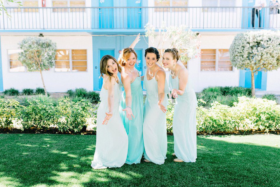 Fun bridesmaid photo. Destination wedding at the Postcard Inn on the Beach by Catherine Ann Photography