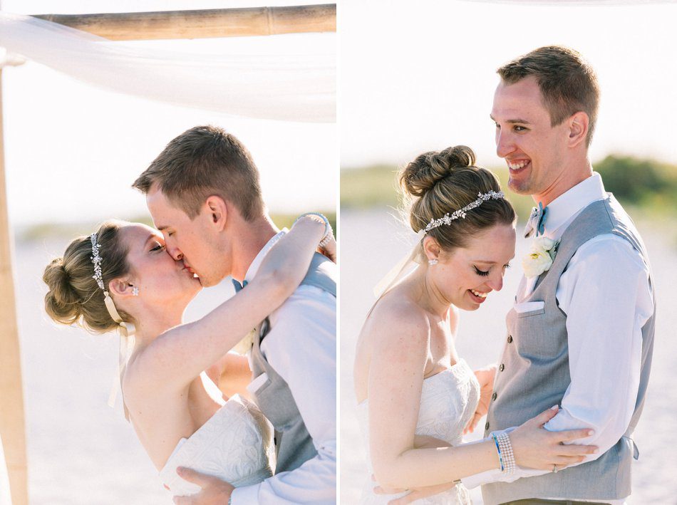 Bride and grooms first kiss photo. Destination wedding at the Postcard Inn on the Beach by Catherine Ann Photography