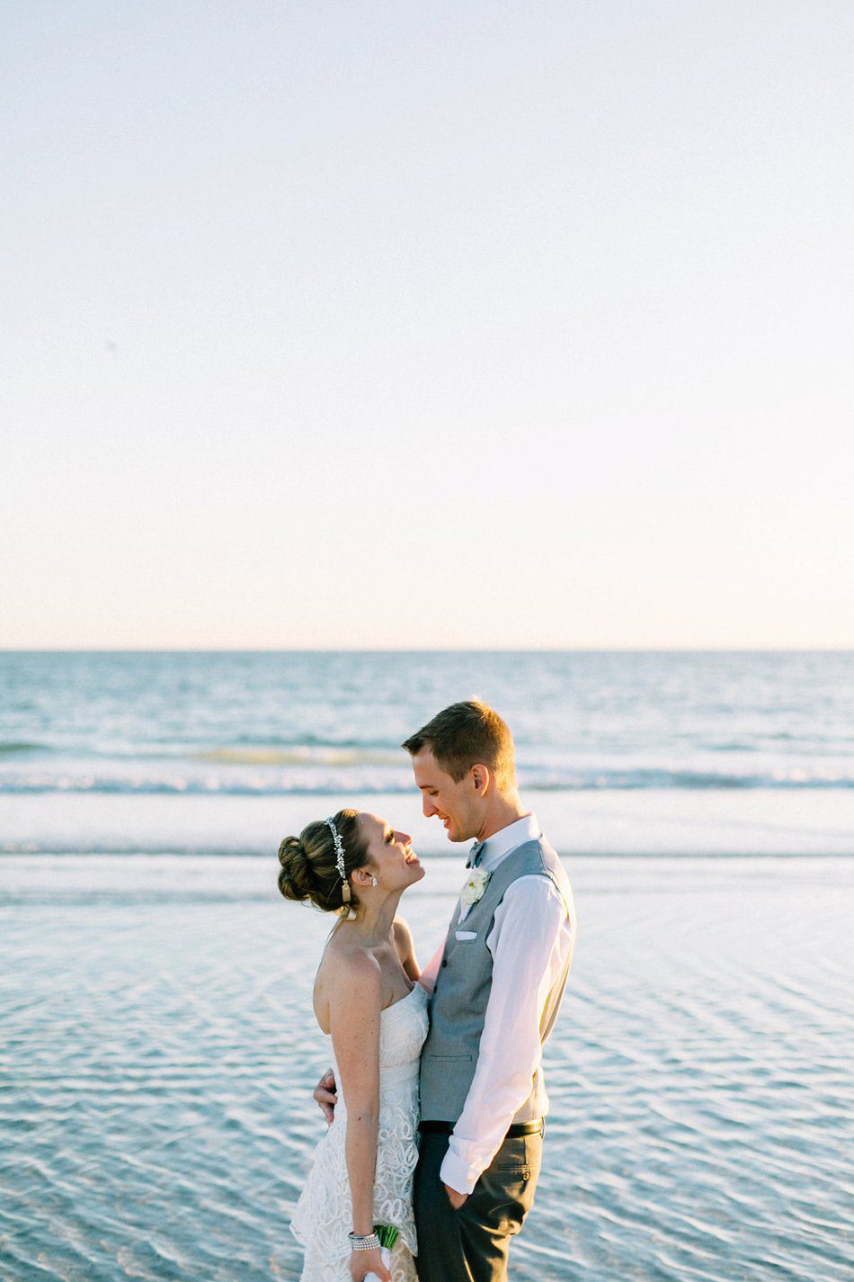 Beach wedding photo by Catherine Ann Photography
