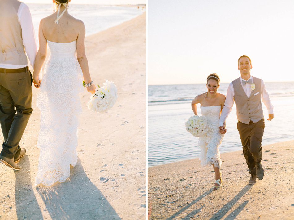 Photo of bride and groom running on the beach