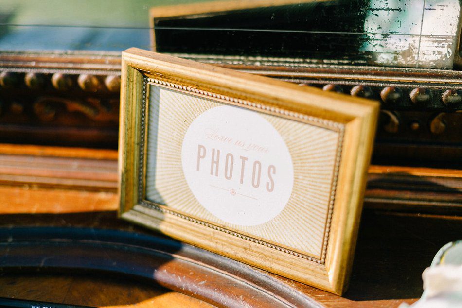 Vintage looking photo sign at a wedding