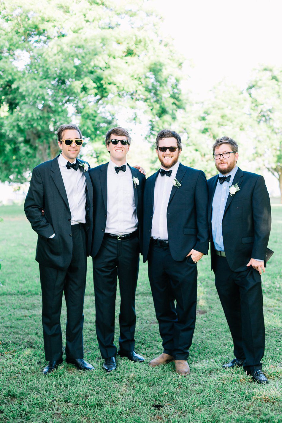stylish groomsmen with sunglasses