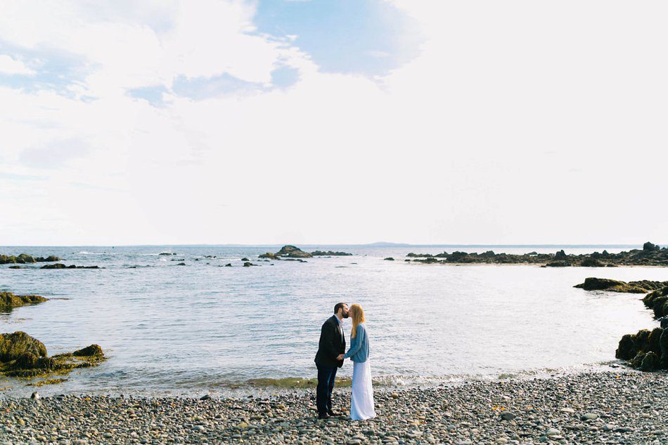 engagement photos on the coast of maine by the atlantic ocean 