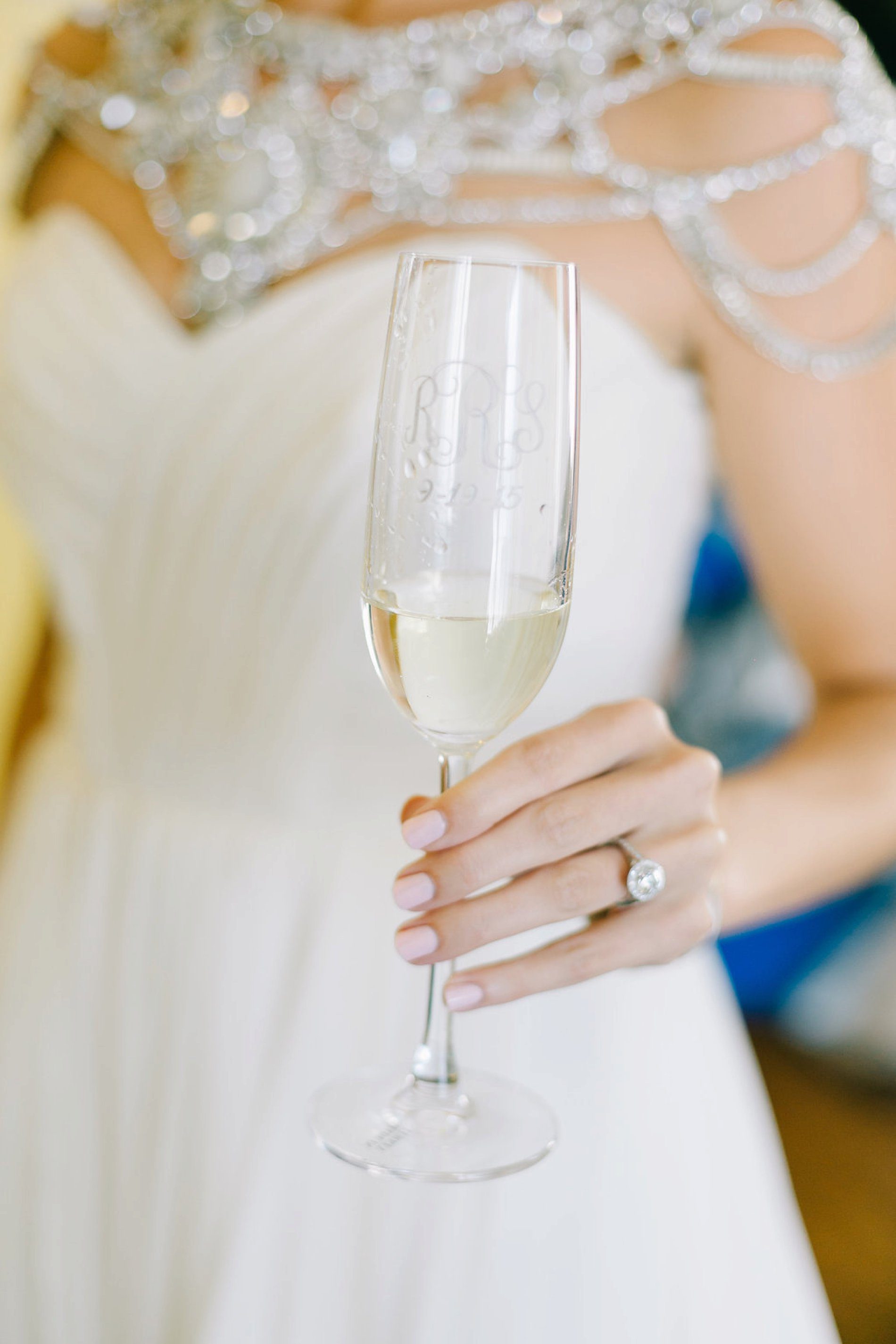 Customized monogrammed champagne glass with wedding date