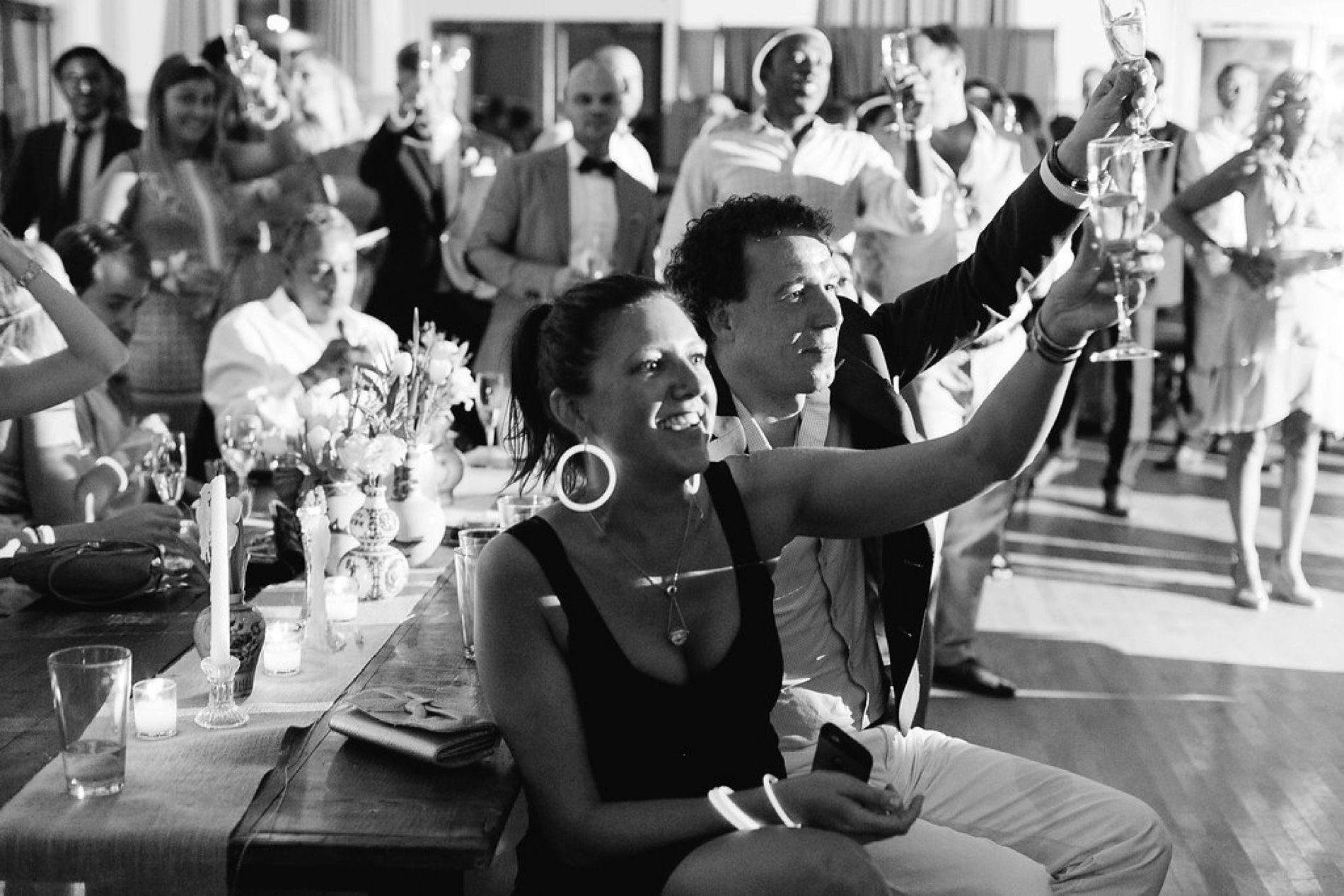 Guests cheering the bride and groom