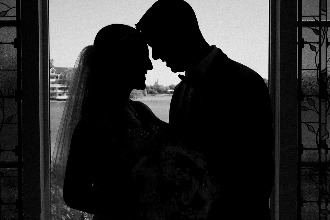 Creative Disney wedding silhouette photo with castle in the background