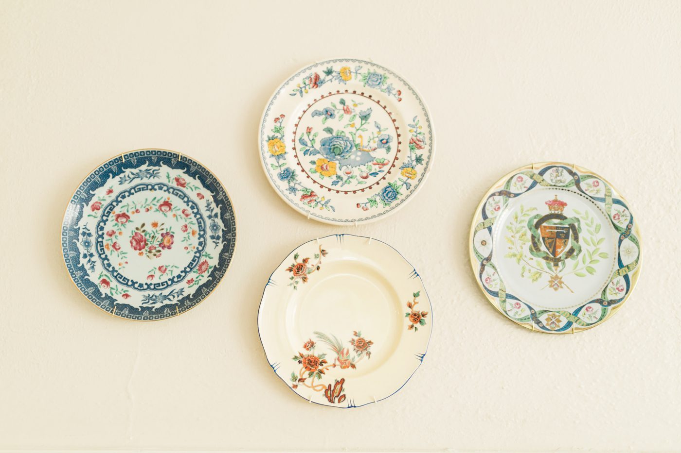 Vintage plates hanging on the wall for home decor