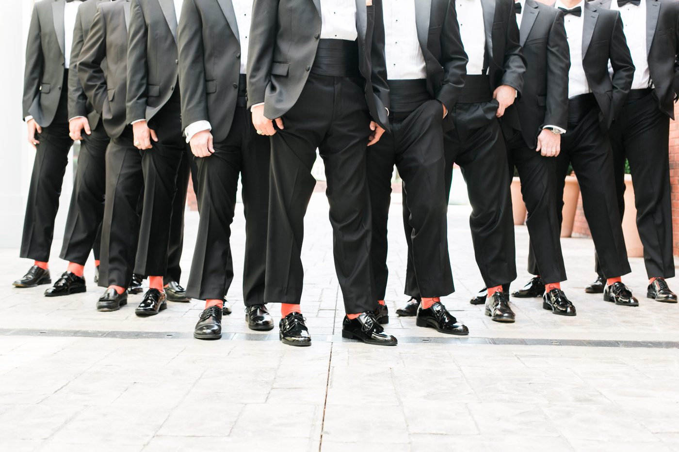 Clemson socks for groom and groomsmen. Photo by Charleston wedding photographer Catherine Ann Photography