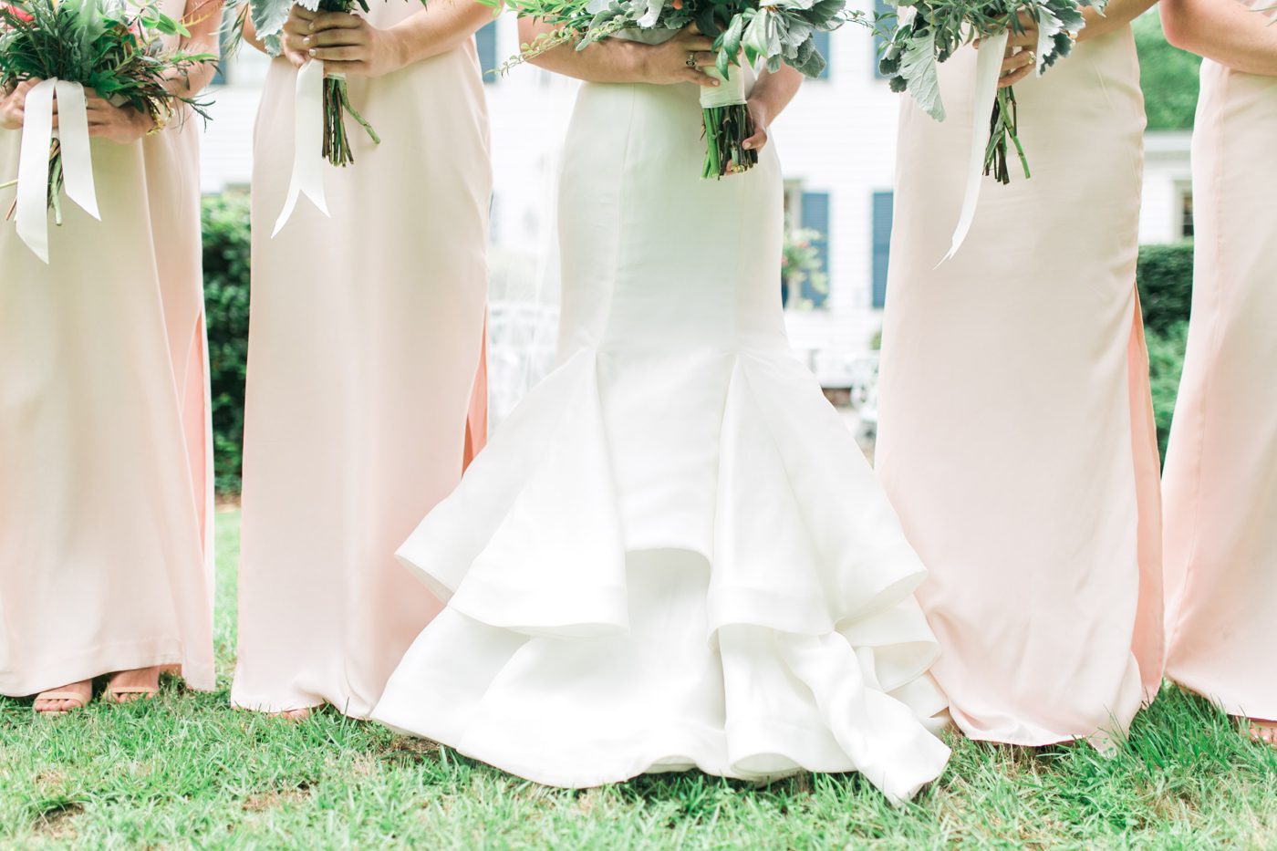 Long pink bridesmaids dresses and Sareh Nouri wedding gown. Photo by Charleston wedding photographer Catherine Ann Photography