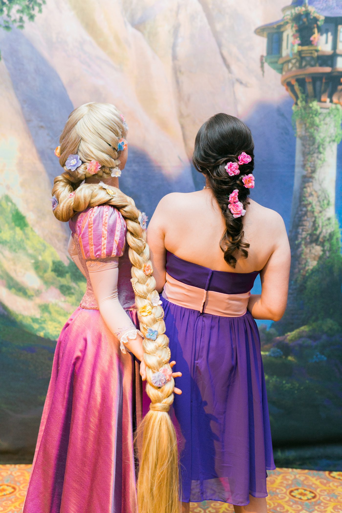 Rapunzel with a bridesmaid at a Disney wedding in Florida