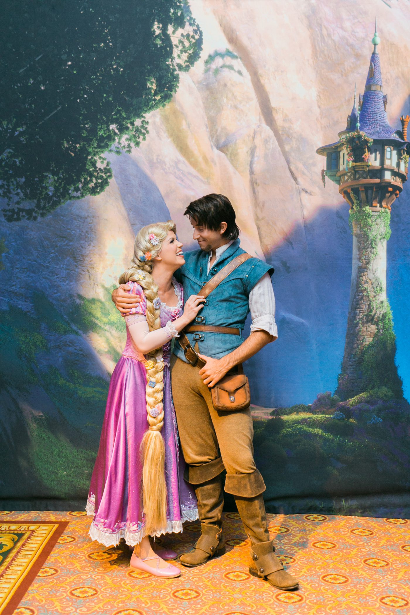 Rapunzel and Flynn Rider face characters attending a Disney World wedding