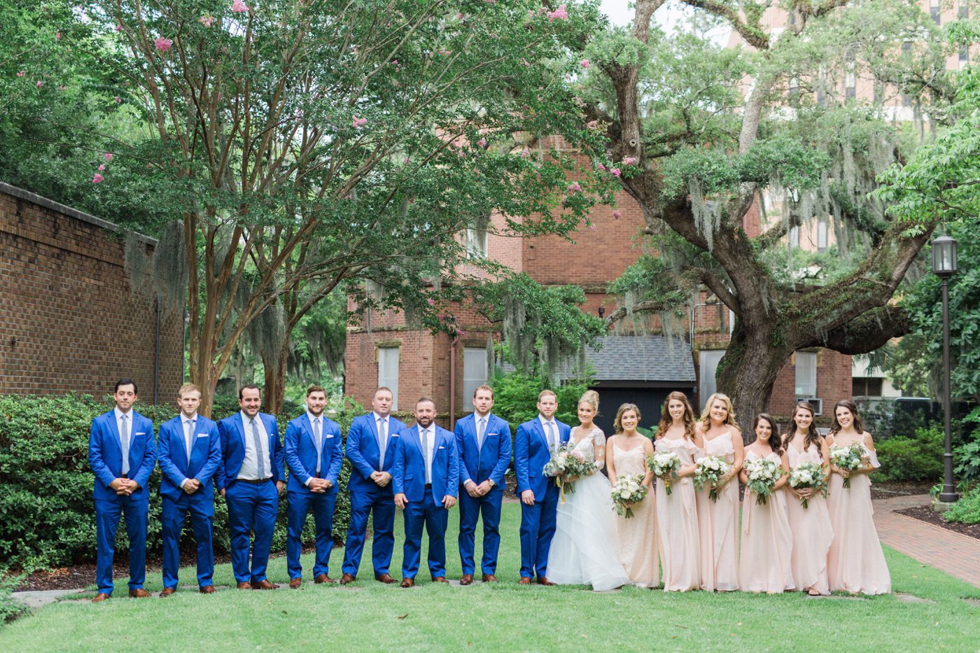 Navy and blush bridal party outfits for a Charleston wedding 
