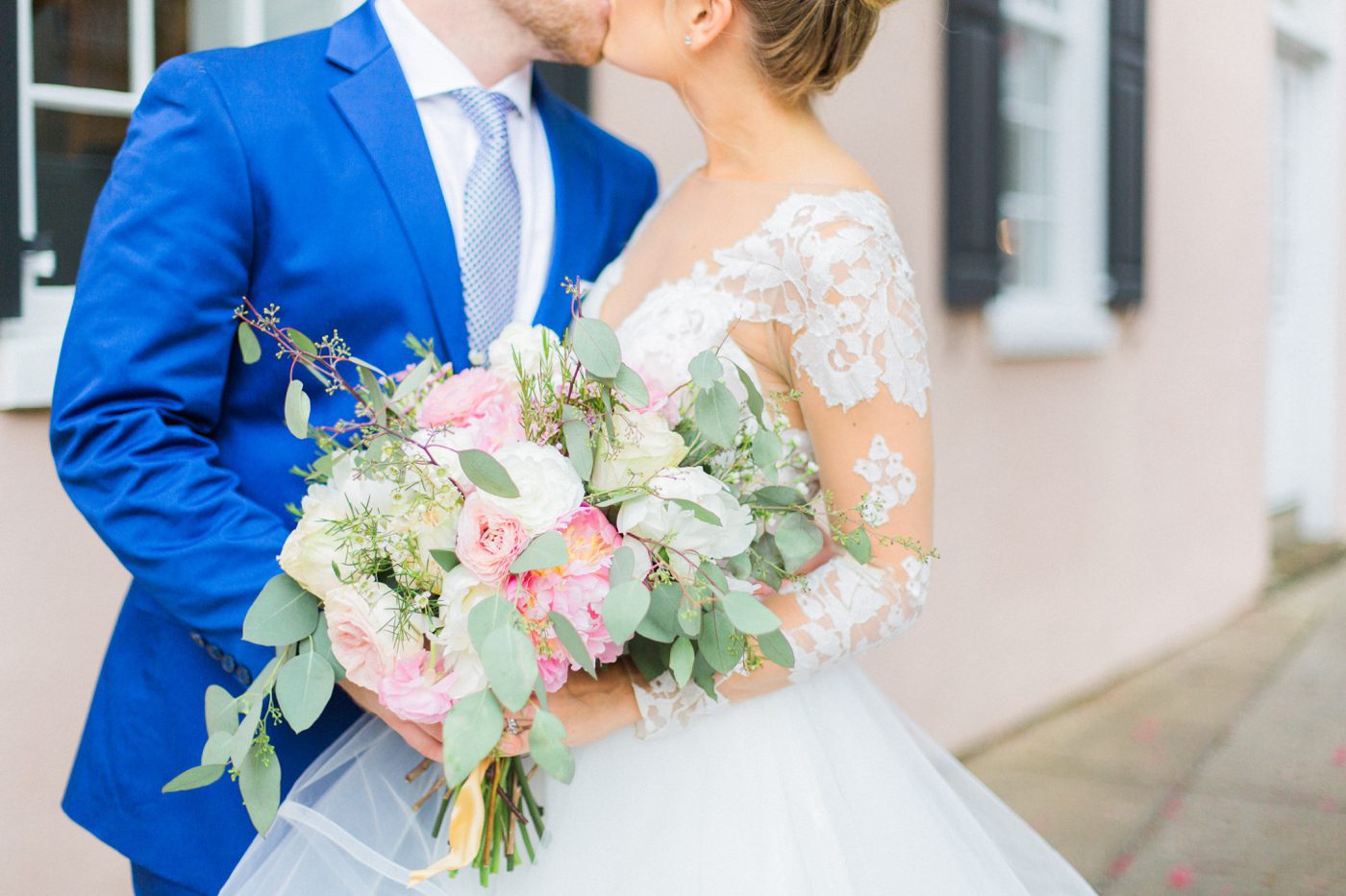 Stunning lace wedding gown and blush and green wedding bouquet for a southern wedding 