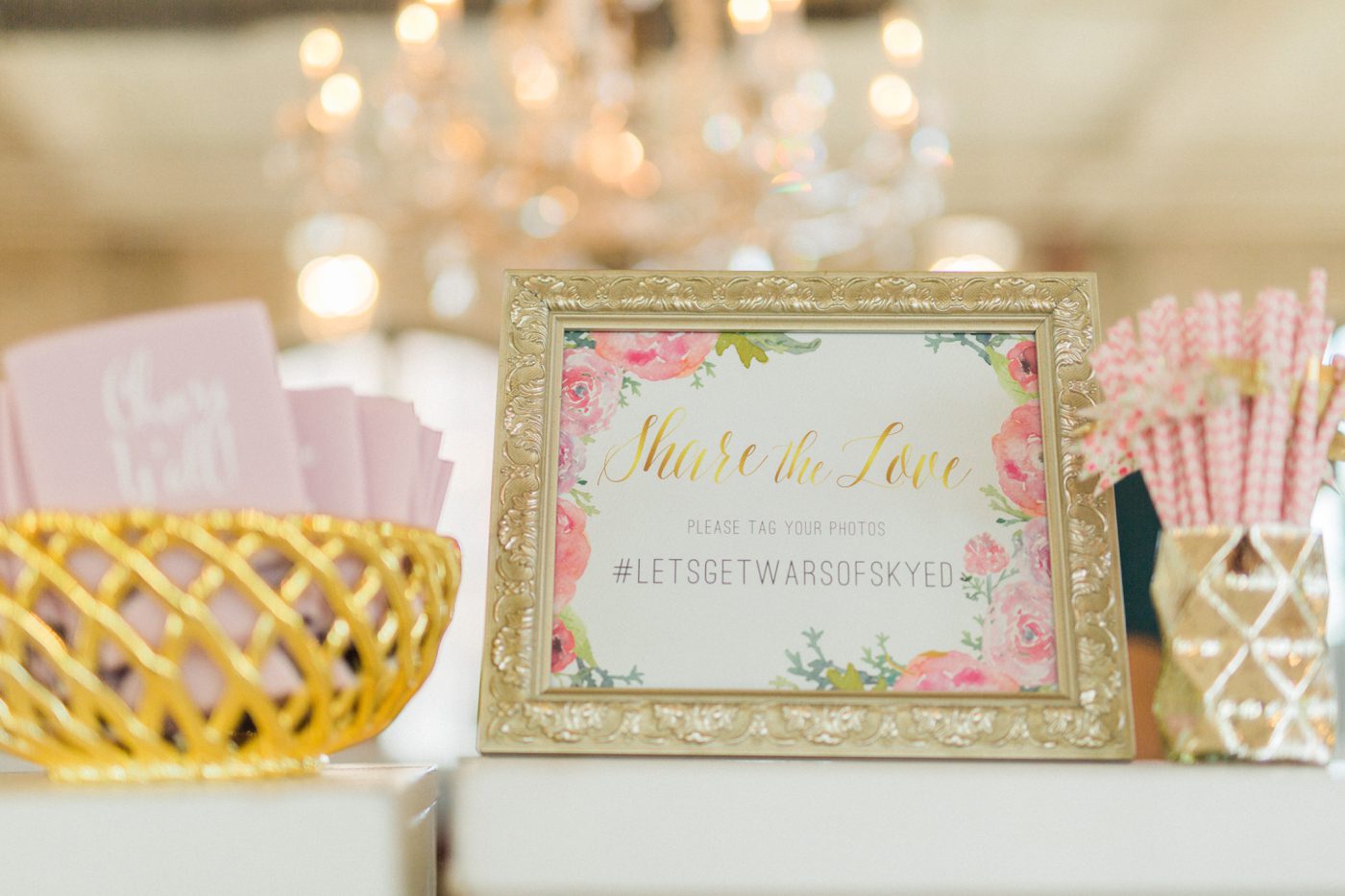 Blush gold and floral wedding reception inspiration with instagram hashtag 