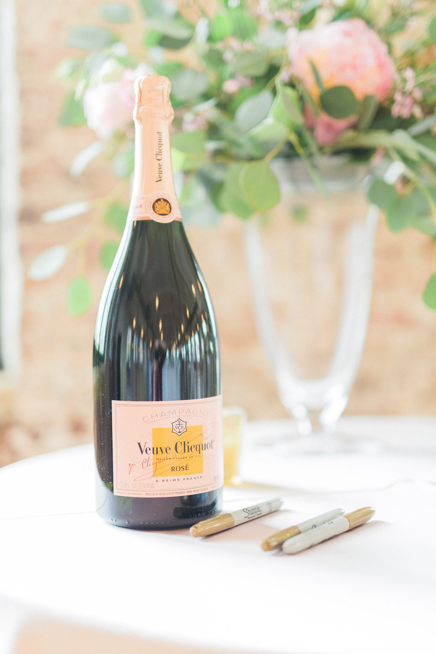 Veuve Clicquot champagne bottle for guests to sign for wedding couple