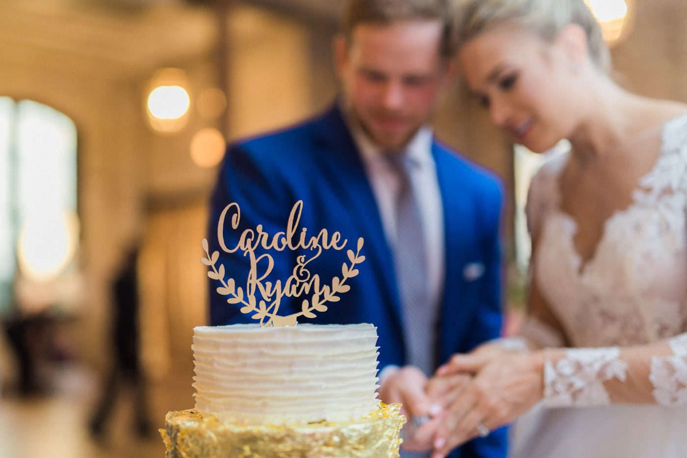 Couple cutting their cake made by Mercantile and Mash 