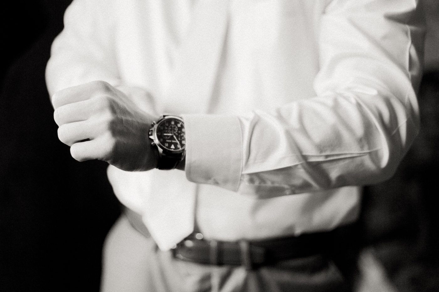 Groom putting on his watch