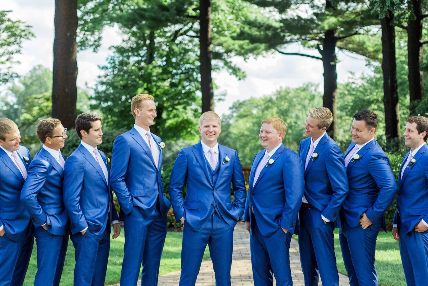 Navy blue suits from Suit Supply for the groom and groomsmen