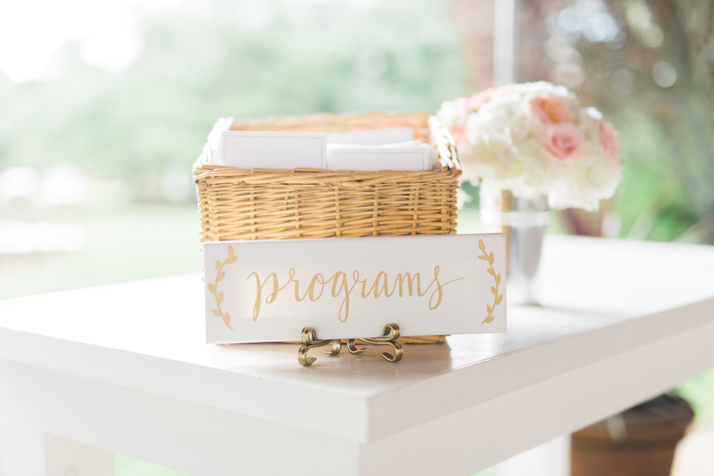 Calligraphy wedding programs sign