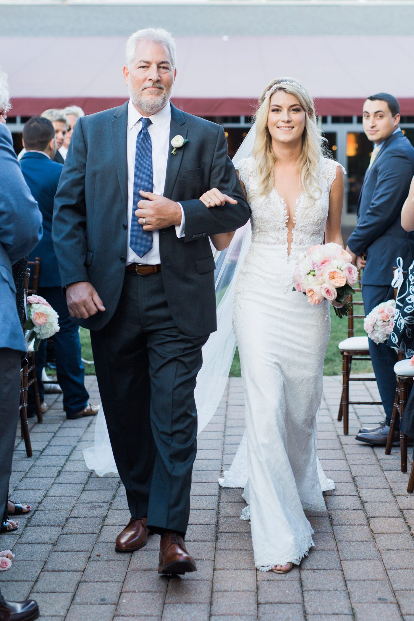 Bride and her dad walking down the aisle in New York