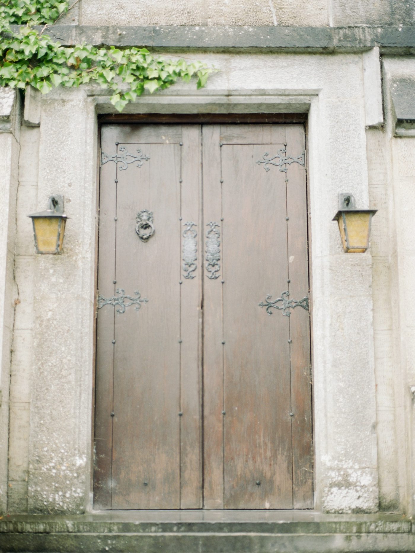 Old wooden door at an Irish castle by Catherine Ann Photography
