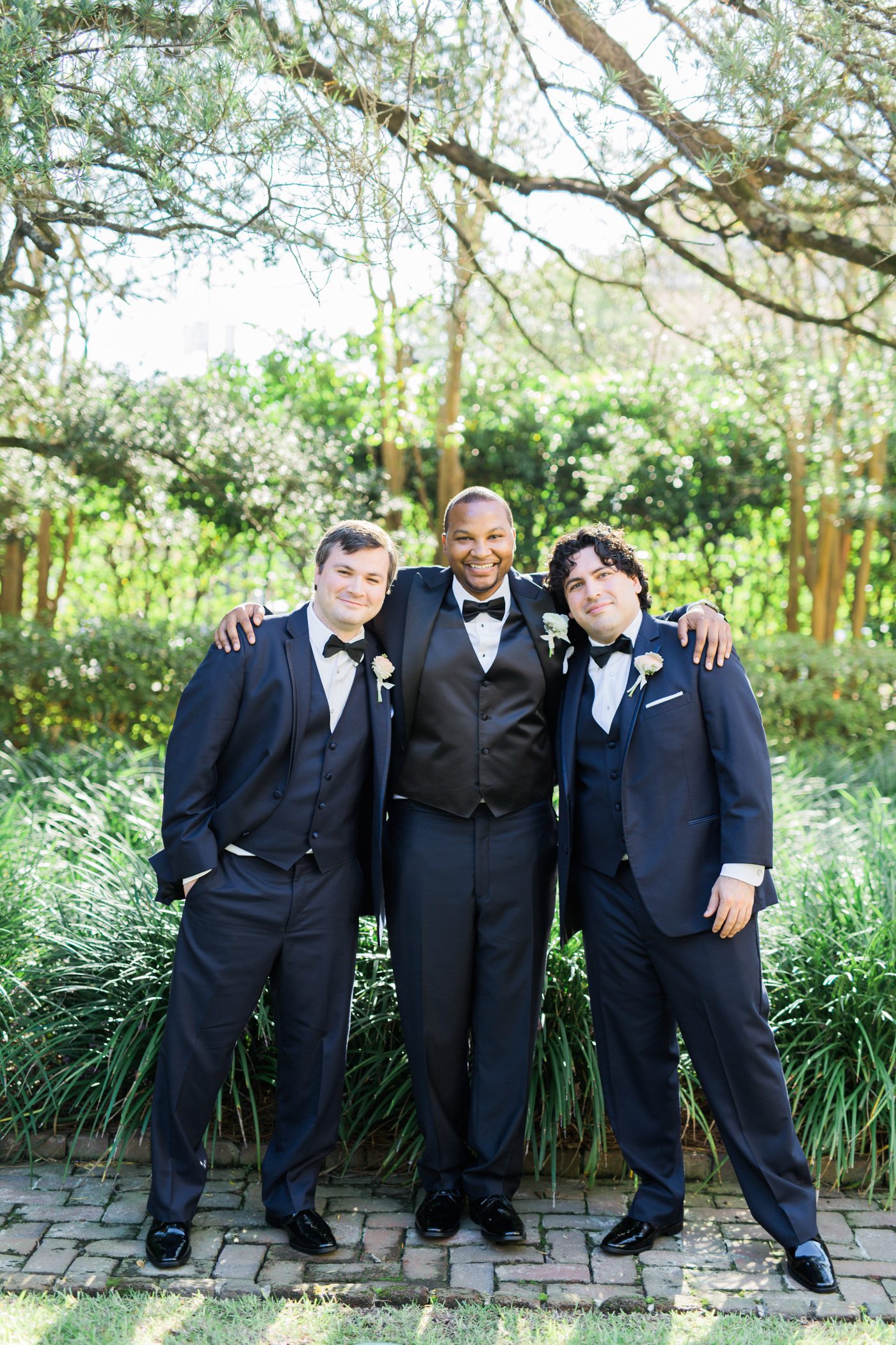 black suit and bowtie for Southern groomsmen