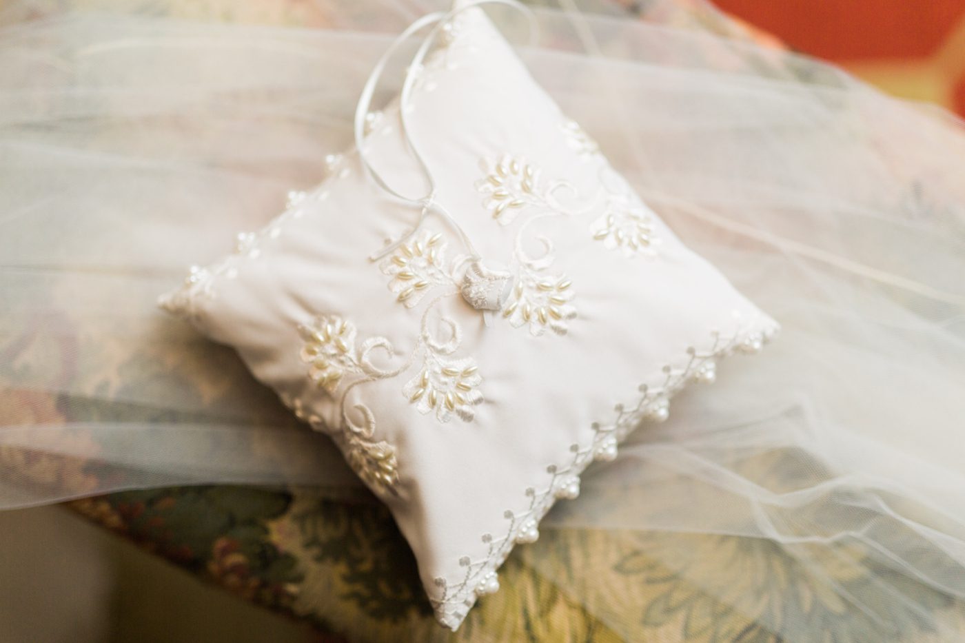 Ring bearer pillow made from mother of the brides wedding gown | Elegant William Aiken House Wedding Photos | Charleston SC wedding photographers Catherine Ann Photography
