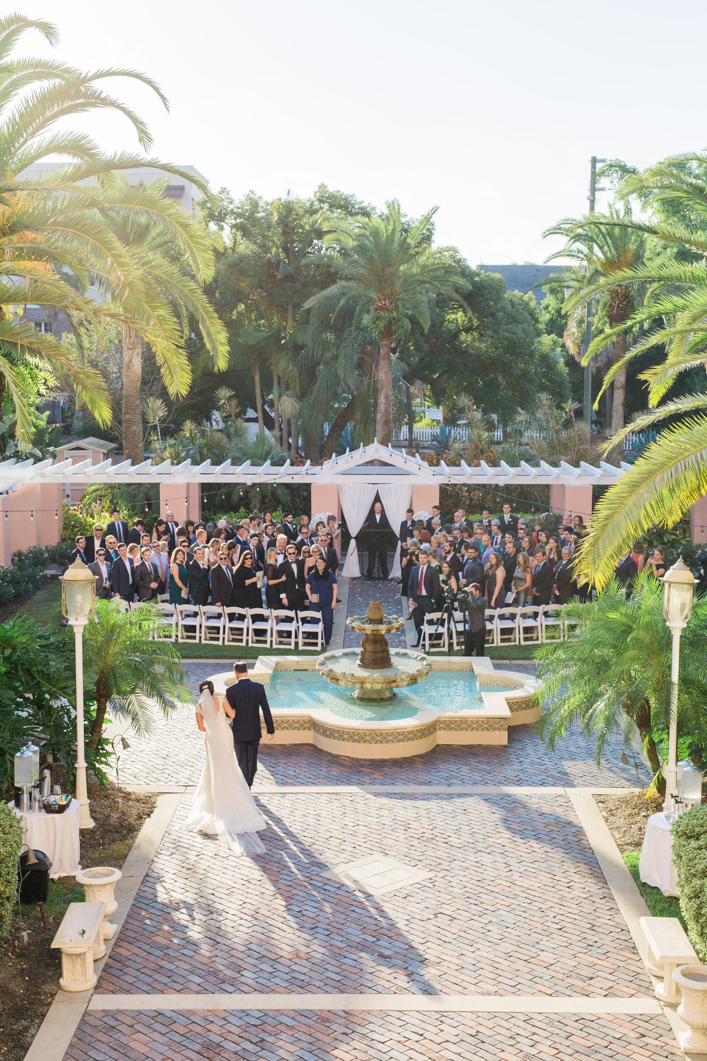 Ceremony at the Vinoy hotel tea garden by Catherine Ann Photography