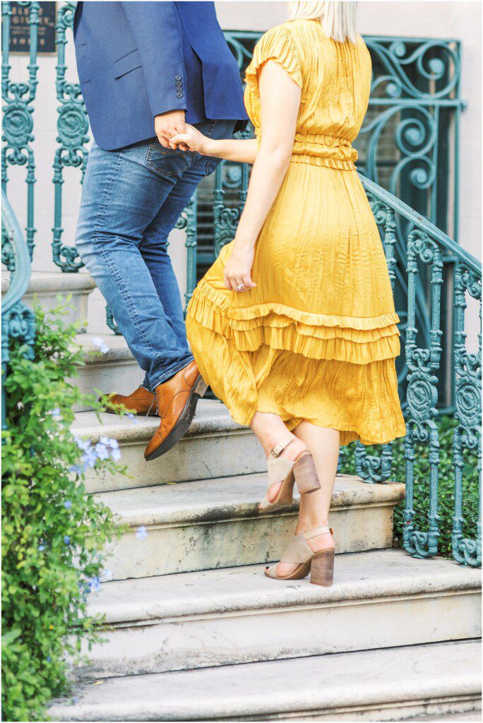 Destination engagement pictures in Charleston with yellow dress by film photographer Catherine Ann Photography