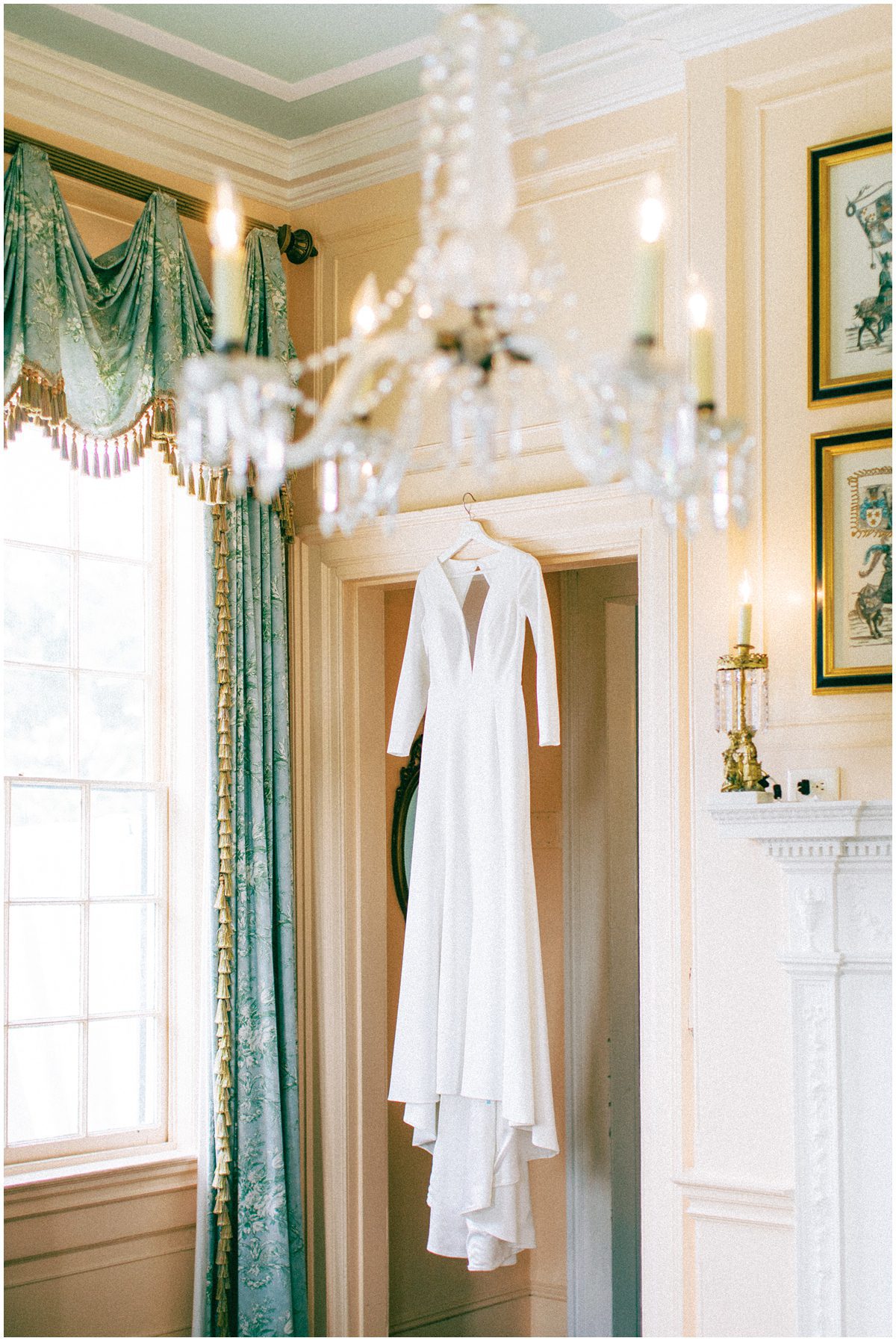 long sleeve wedding dress hanging up at Lowndes Grove