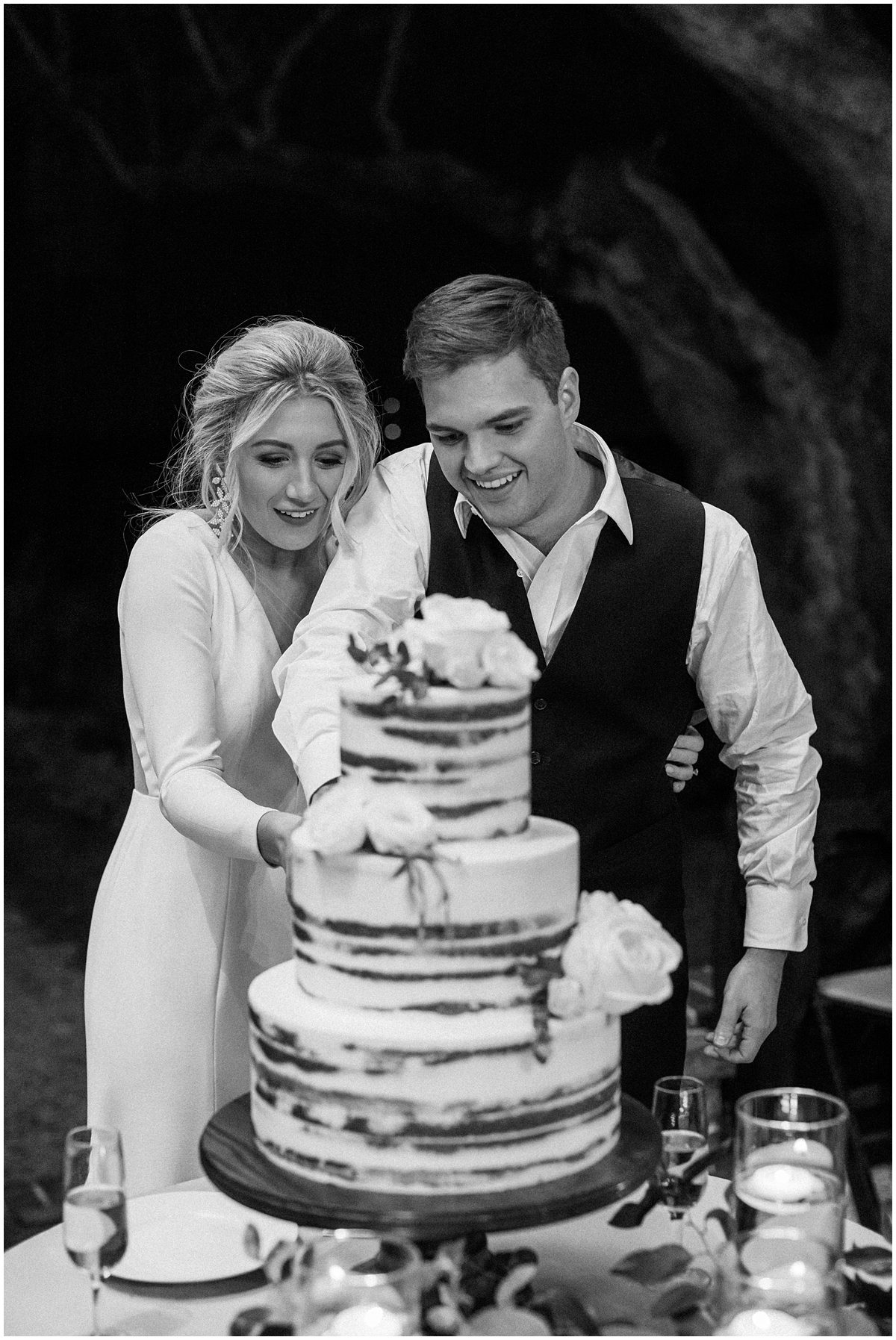 wedding couple cutting their cake