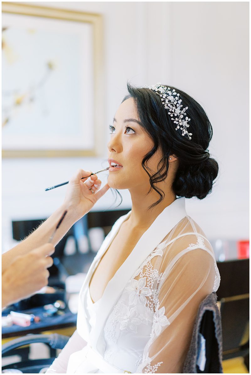 bride getting makeup done at Belmond Place in Charleston SC