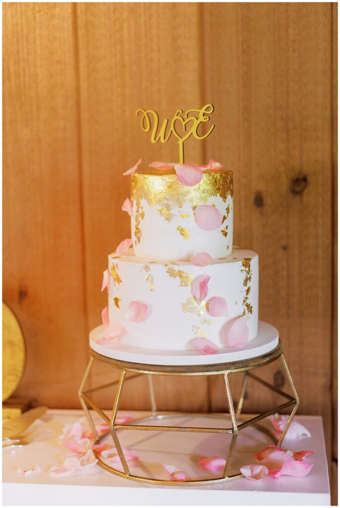 pink and gold two tiered wedding cake