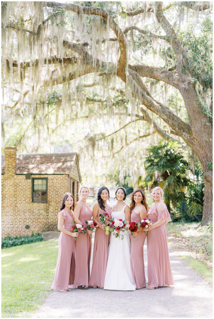 bridesmaids wearing dusty pink dresses at Middleton Place wedding