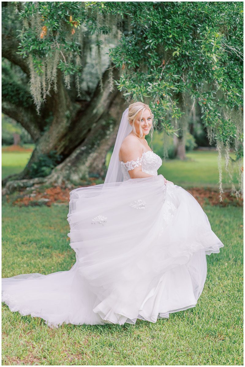 a bride twirling in her romantic princess ballgown