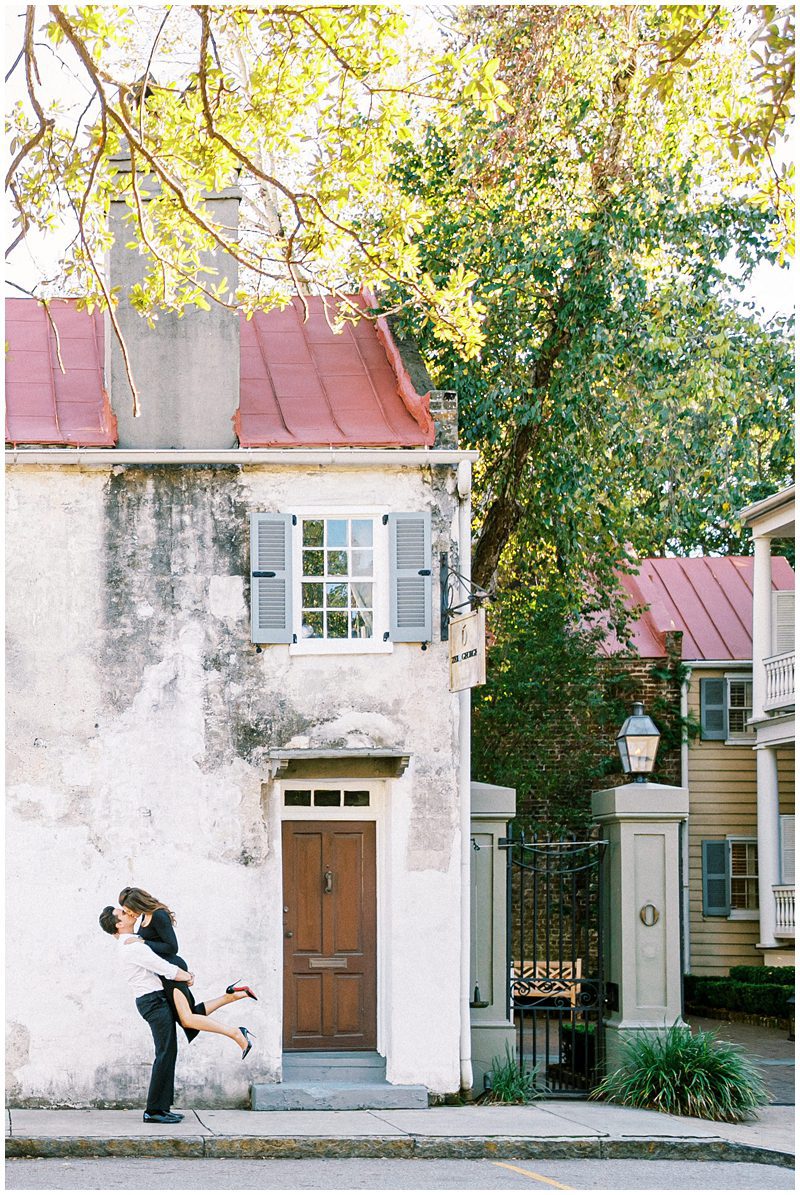 engagement photos in front Zero George St hotel in Charleston