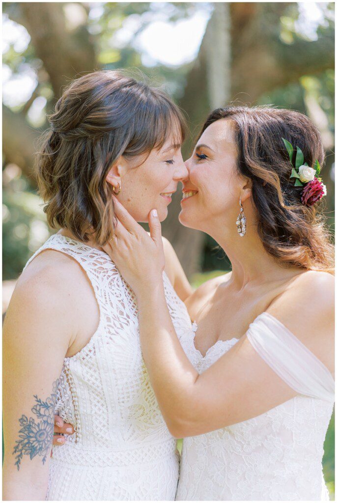 Romantic wedding photo of two brides at Lowndes Grove