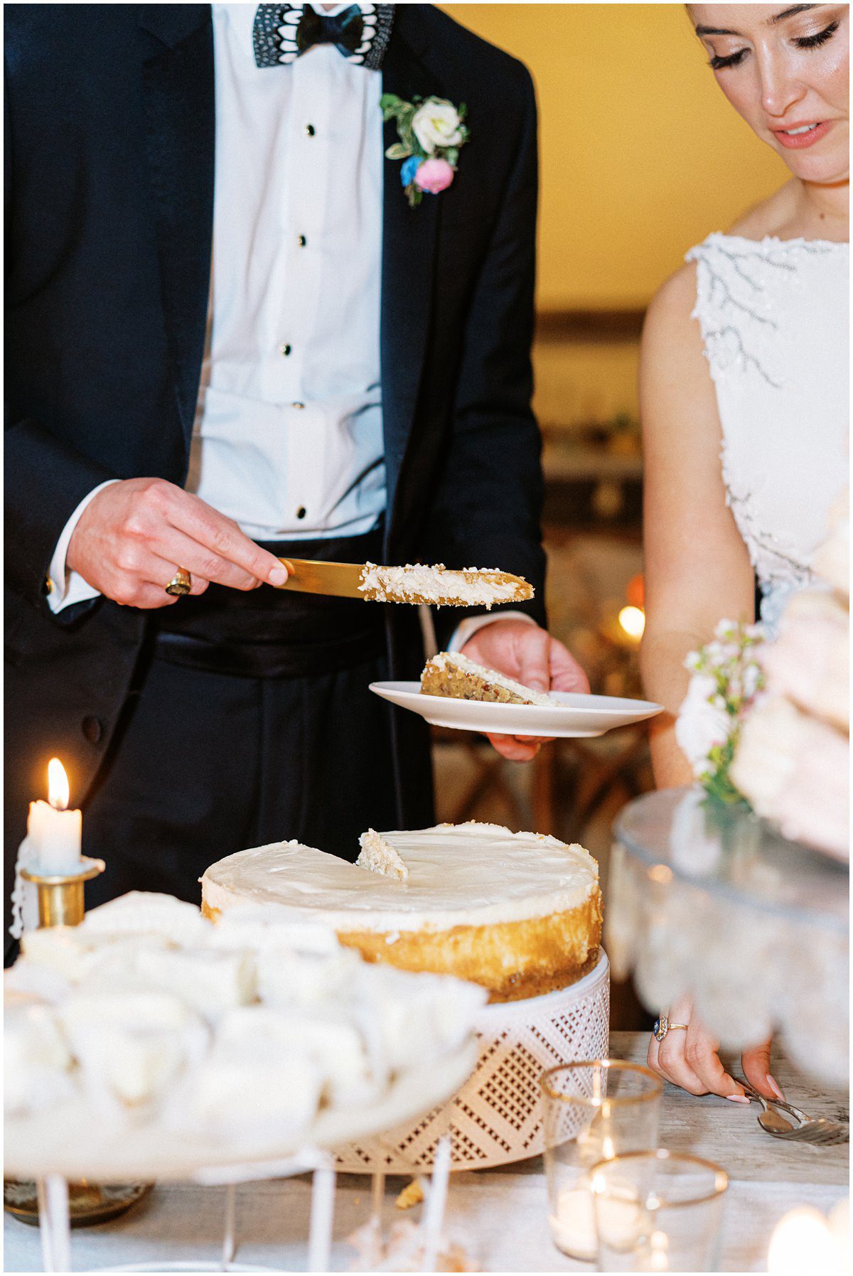 bride and groom cutting into a non-traditional cheesecake made by Ally and Eloise in Columbia SC