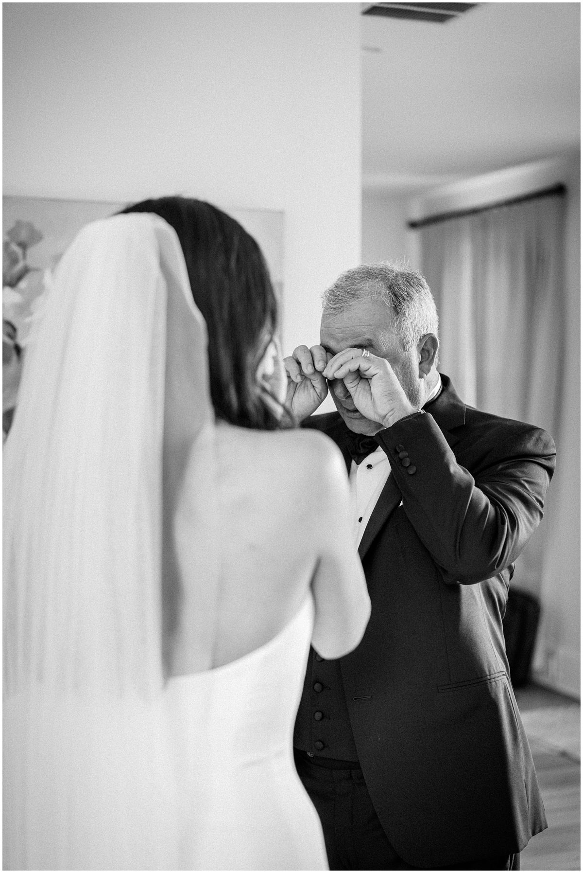 Bride Kenzie shares a special moment on her wedding day with her dad during their emotional first look at a private estate in Cashiers NC