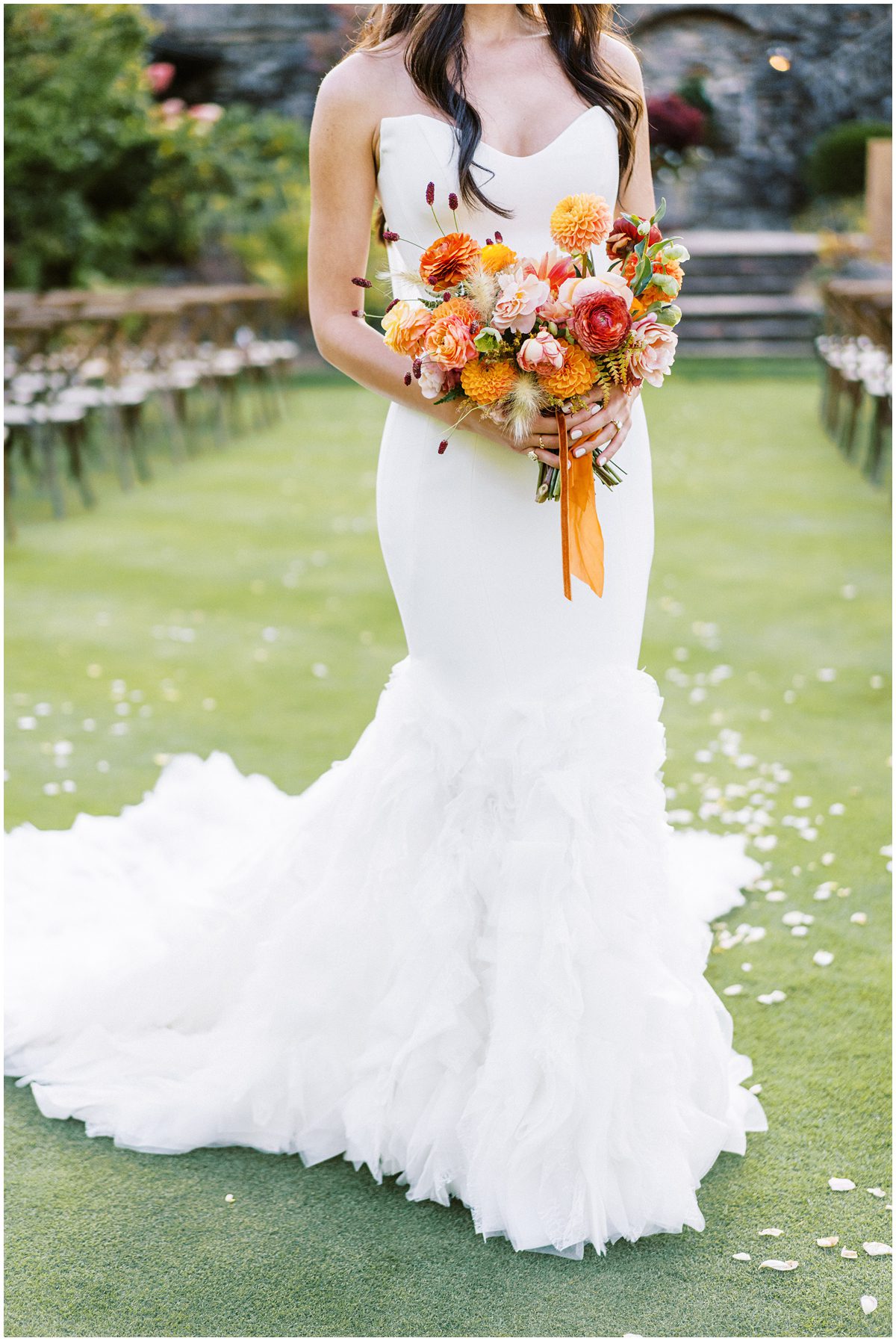 a pink, yellow, orange and maroon wedding bouquet for a Fall mountain wedding