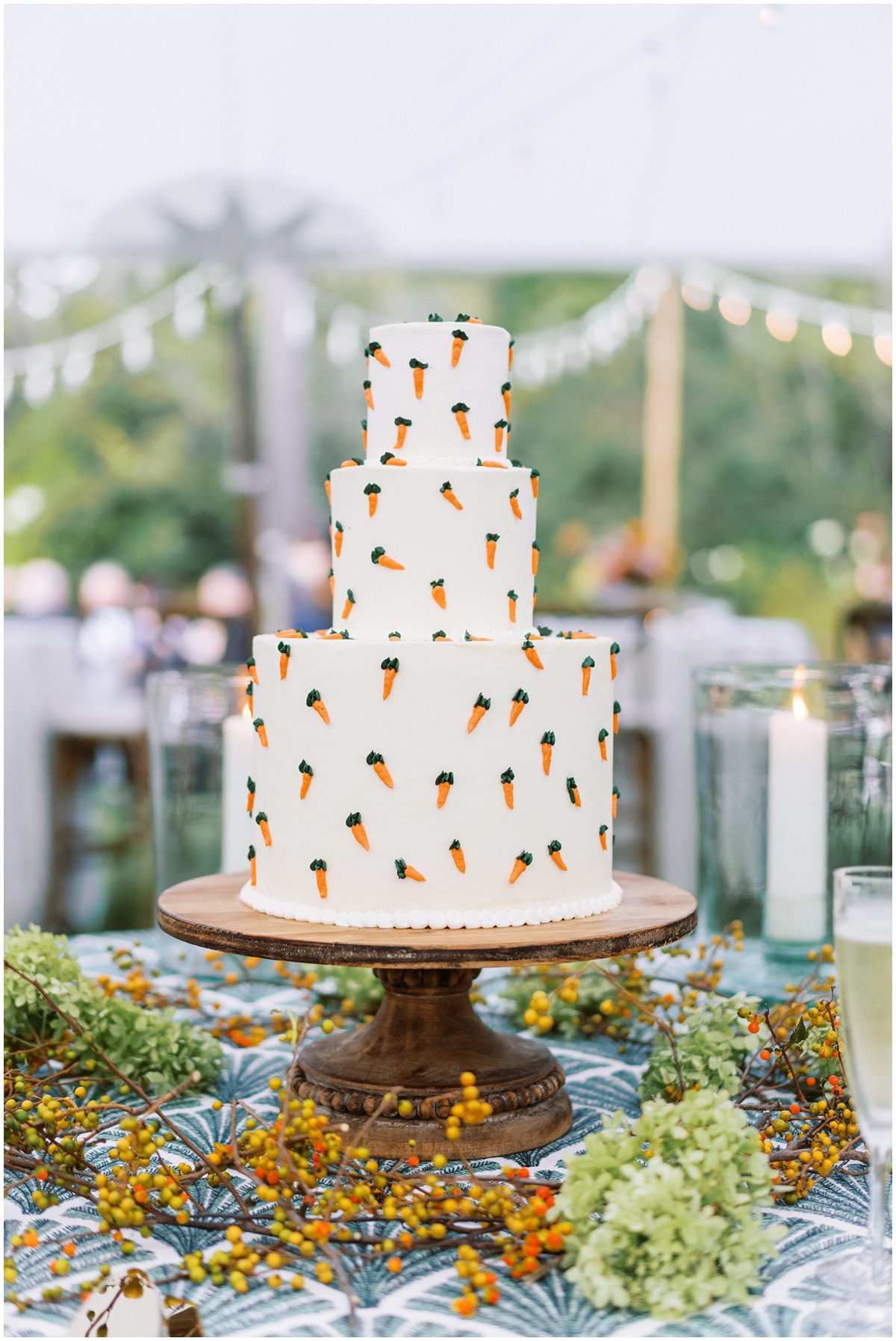 The stunning carrot cake designed by Mountaintop Golf and Lake club, decorated with delicate frosting and tiny carrots, is a work of art that perfectly captures the couple's personalities