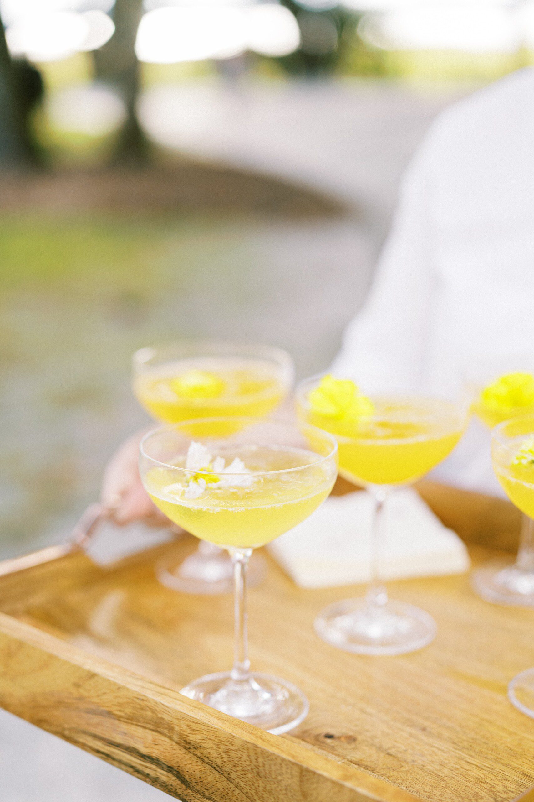 Refreshing yellow cocktails for a summer garden wedding at Oheka Castle in New York
